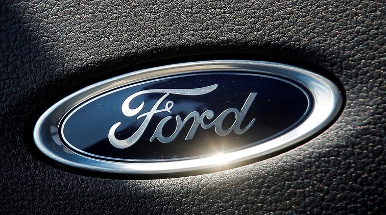 The Ford name plate is seen on the interior of the Ford F-150 Lightning pickup truck .
