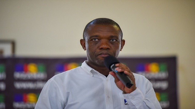 RISE Mzansi National Leader Songezo Zibi addresses community members in Mqanduli.