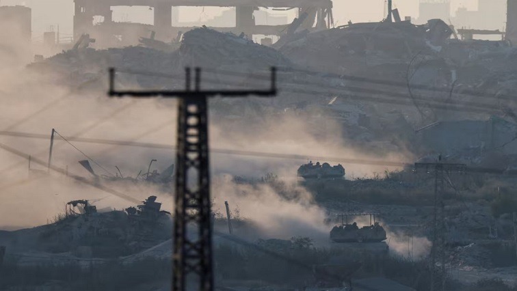 Israeli tanks operate inside Gaza near the Israel-Gaza border, amid the Israel-Hamas conflict, in Israel.